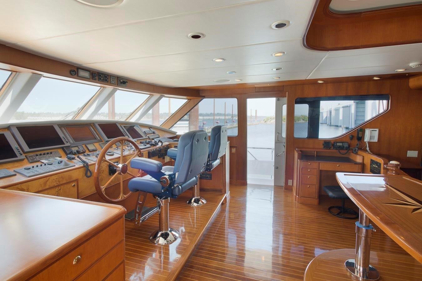 inside of a building with a desk and chairs aboard SILVER WINGS Yacht for Sale
