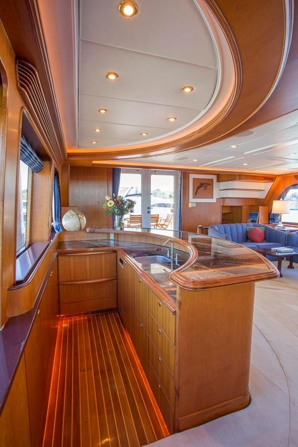 a large kitchen with a large island aboard SILVER WINGS Yacht for Sale