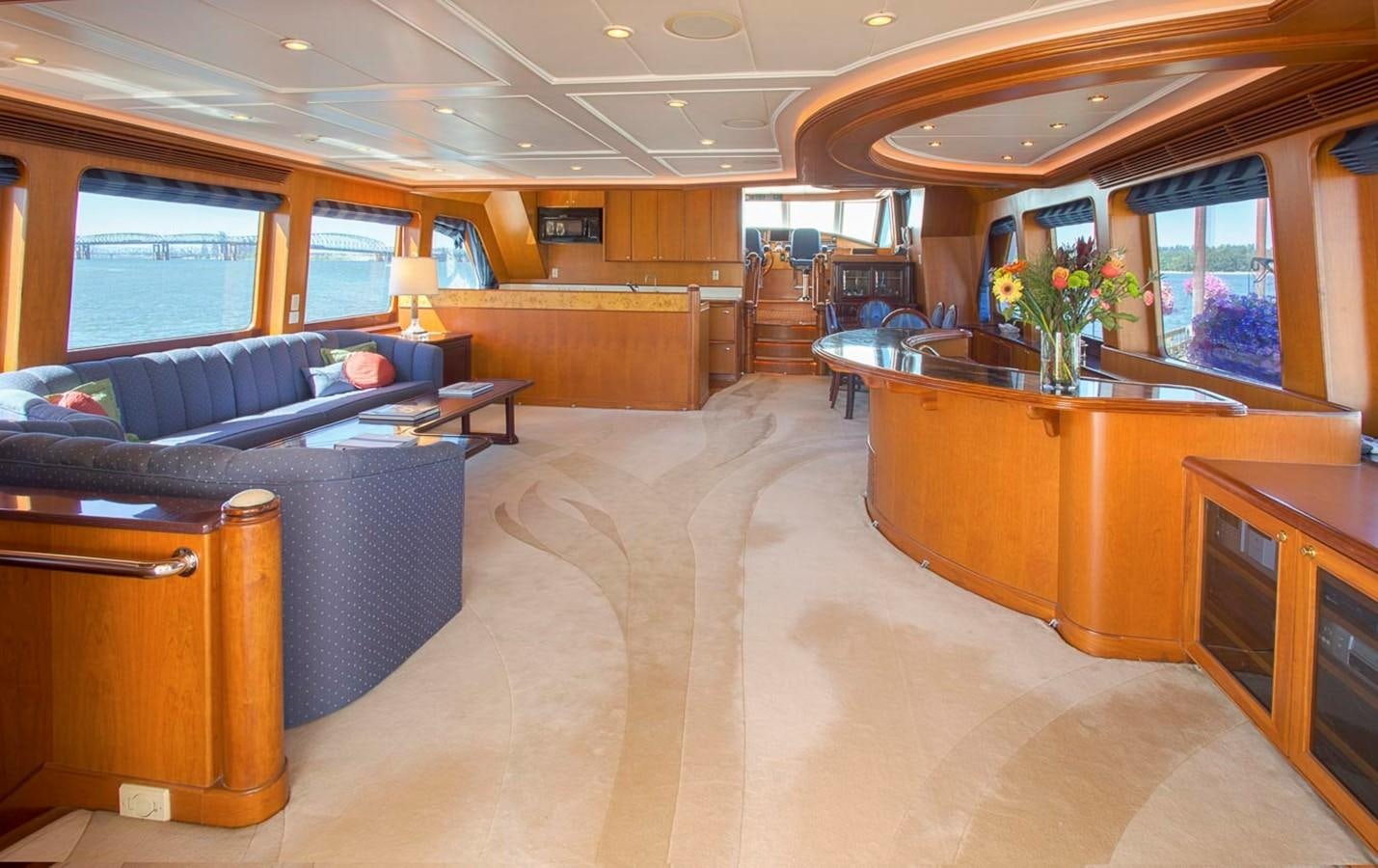 a large living room with a couch and a coffee table aboard SILVER WINGS Yacht for Sale