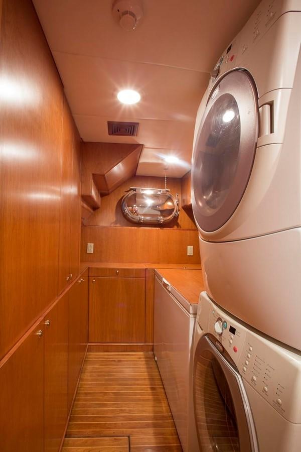 a washing machine in a room aboard SILVER WINGS Yacht for Sale