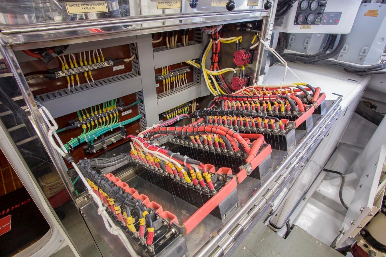 a large group of colorful wires in a server room aboard SILVER WINGS Yacht for Sale