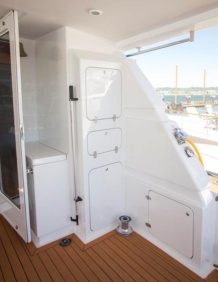 a white cabinet with drawers aboard SILVER WINGS Yacht for Sale