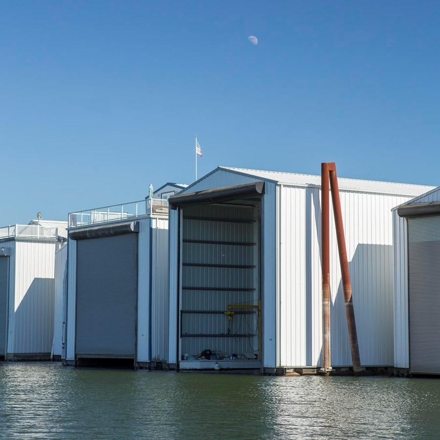 a building with a white roof aboard SILVER WINGS Yacht for Sale