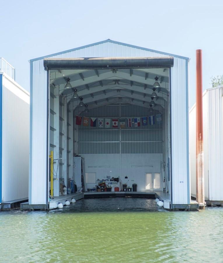 a building with a red pole aboard SILVER WINGS Yacht for Sale