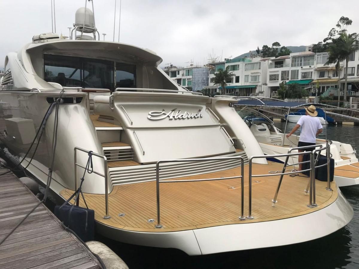 a person standing on a boat aboard PERSHING 90/12 Yacht for Sale