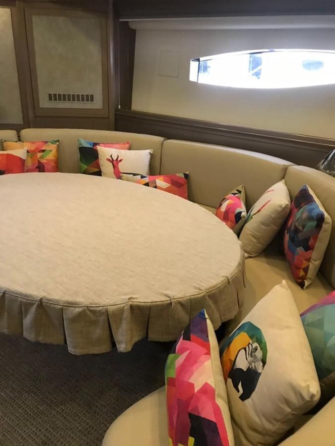 a bed with pillows and blankets aboard PERSHING 90/12 Yacht for Sale