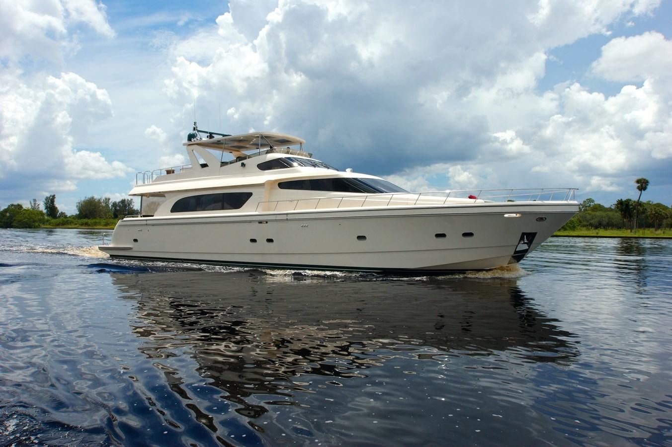 a white yacht on the water aboard LORI ANN Yacht for Sale