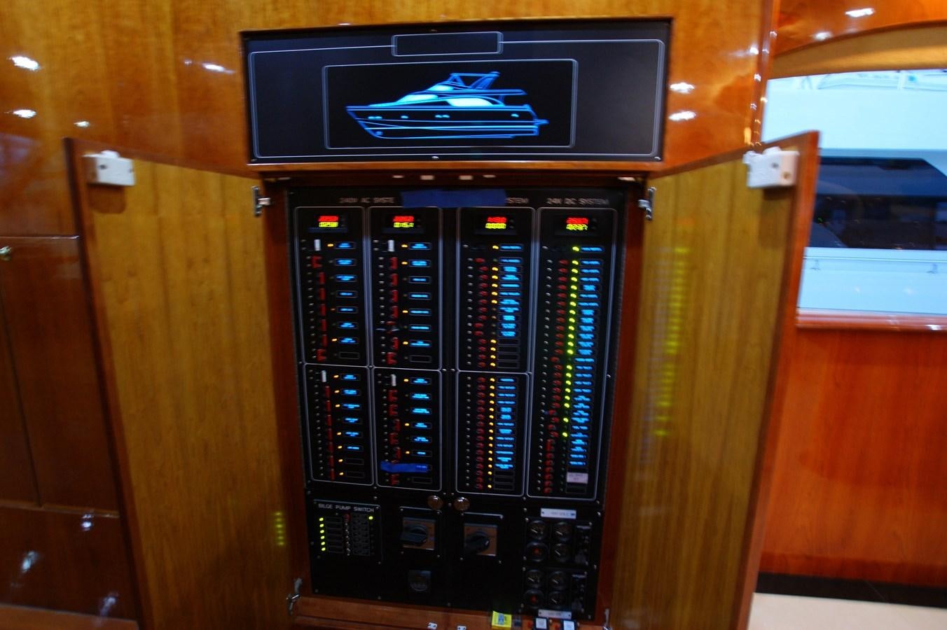 a computer tower with a screen aboard LORI ANN Yacht for Sale