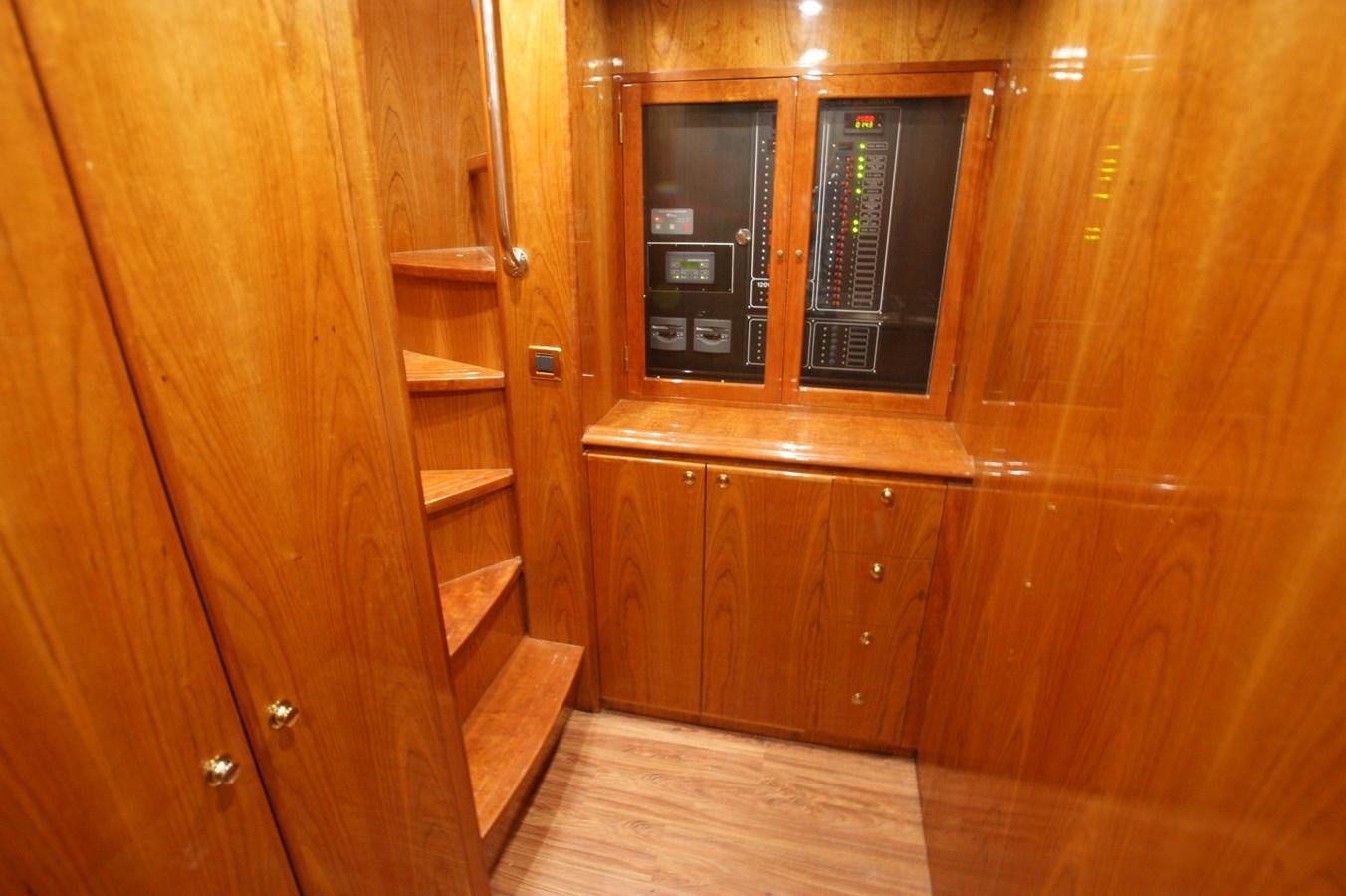 a wooden cabinet with a vent aboard LORI ANN Yacht for Sale