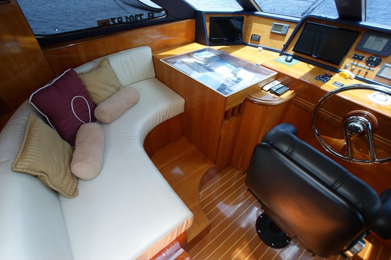 a couch in a room aboard LORI ANN Yacht for Sale