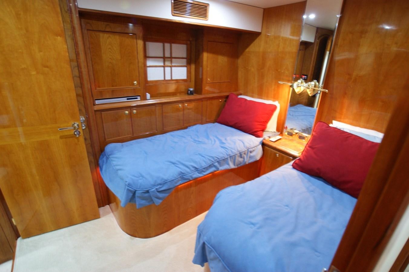 a room with two beds aboard LORI ANN Yacht for Sale