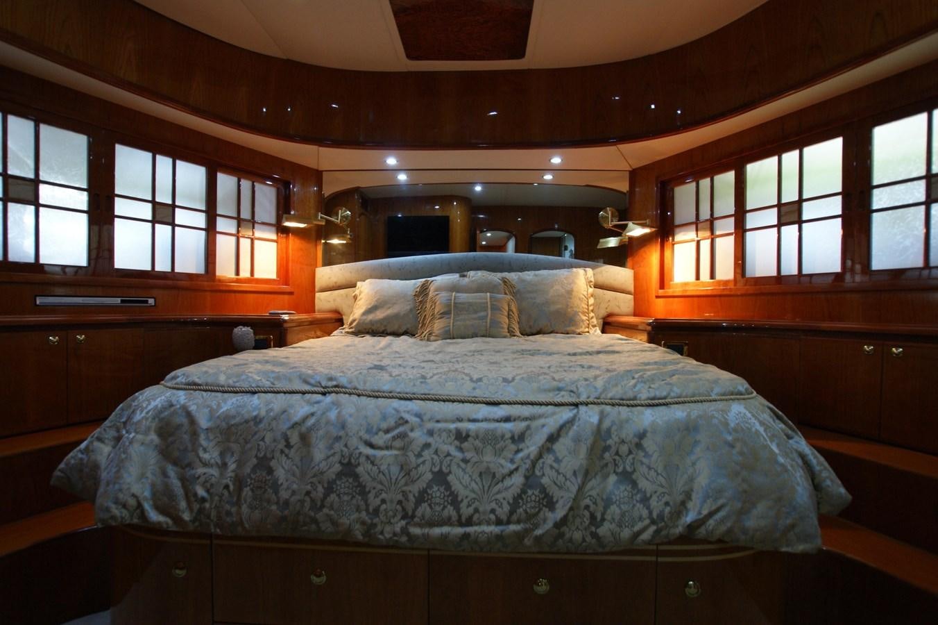 a bed in a room aboard LORI ANN Yacht for Sale