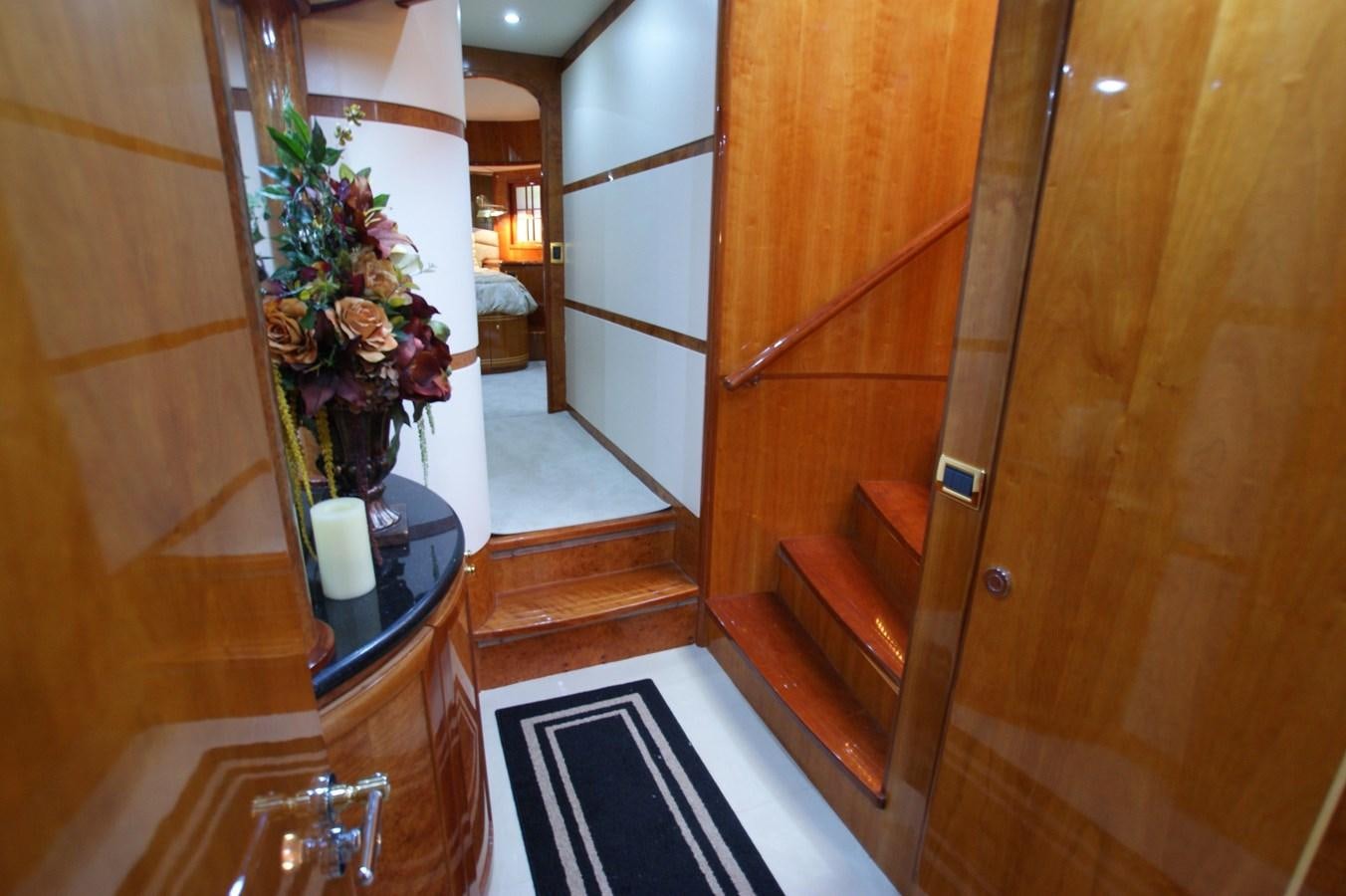 a bathroom with a blue rug aboard LORI ANN Yacht for Sale