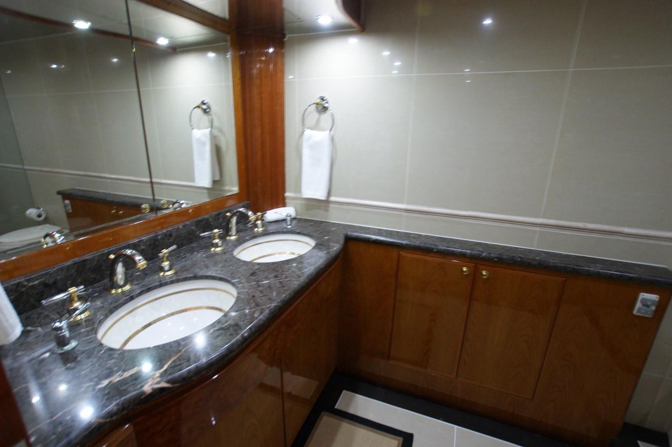 a bathroom with two sinks aboard LORI ANN Yacht for Sale
