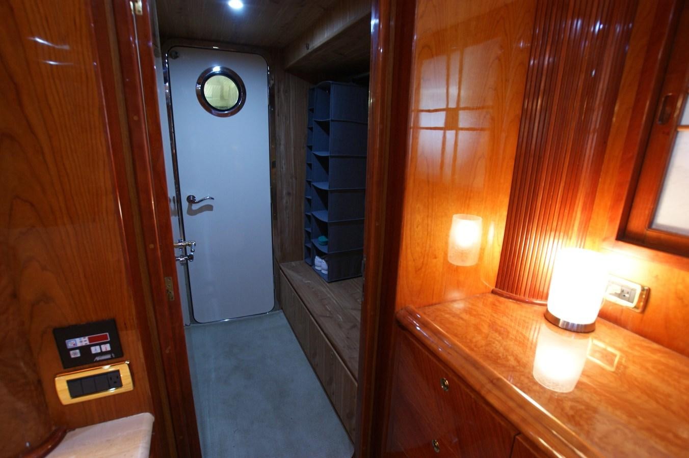 a bathroom with a sink and a mirror aboard LORI ANN Yacht for Sale