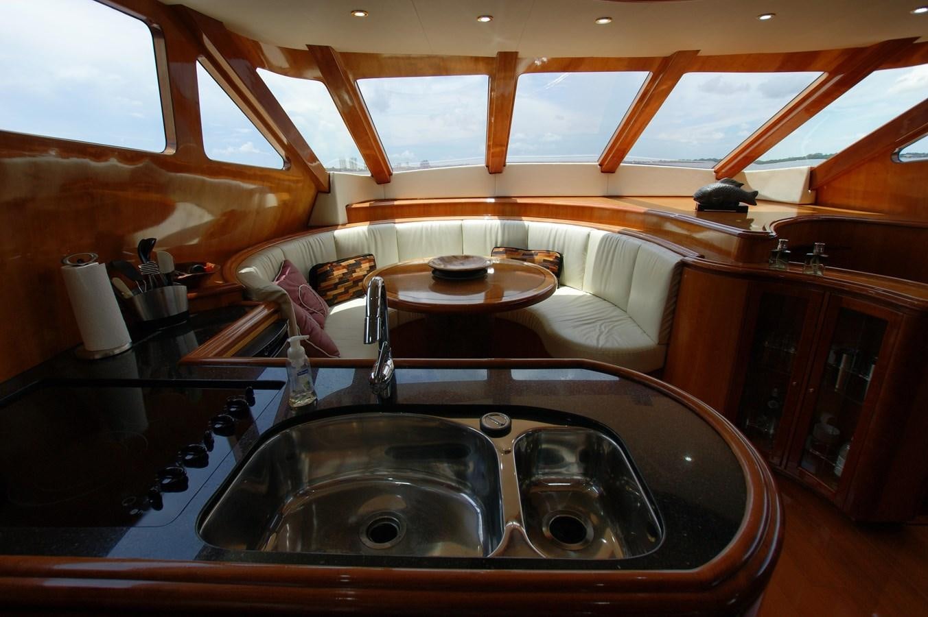a kitchen with a sink and a stove aboard LORI ANN Yacht for Sale