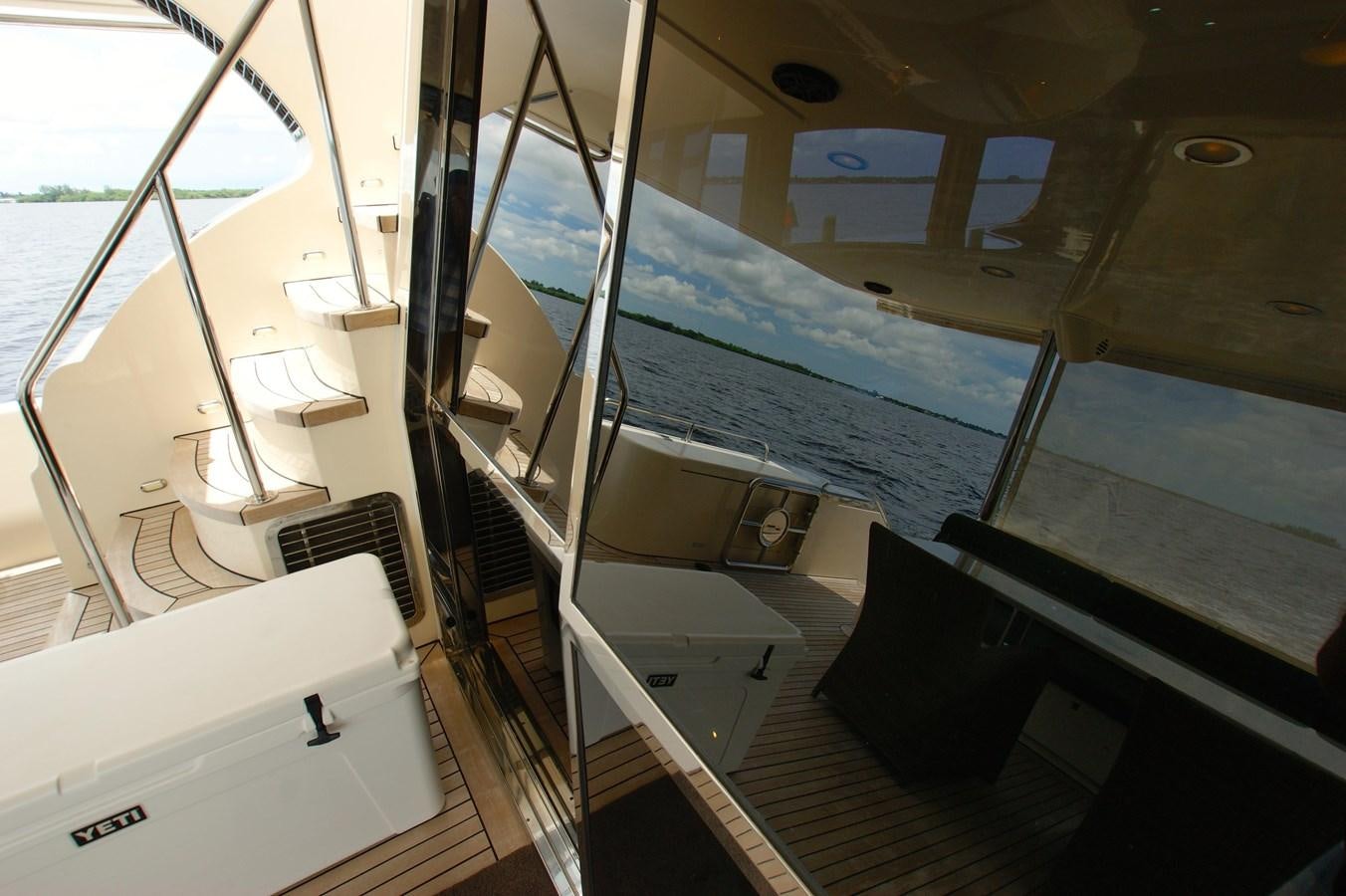 a boat with a large glass window aboard LORI ANN Yacht for Sale