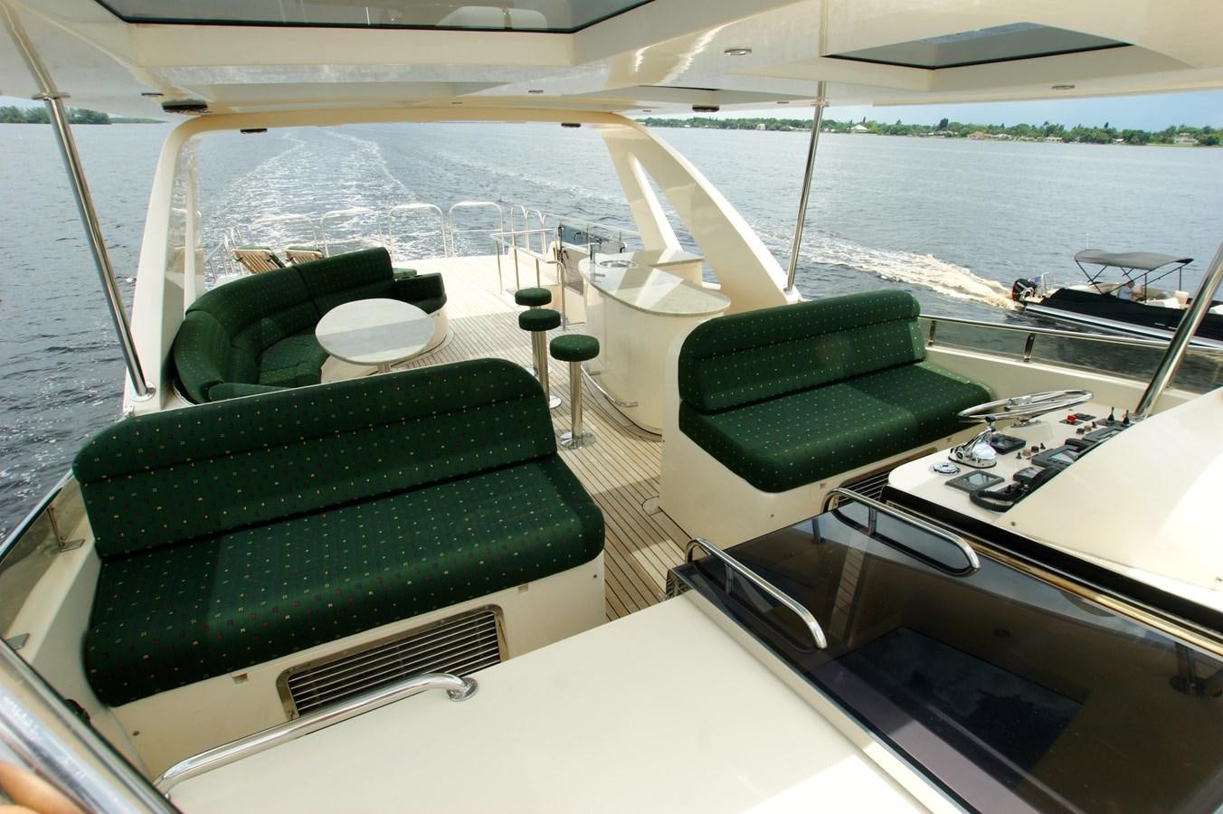 a boat with a green seat aboard LORI ANN Yacht for Sale