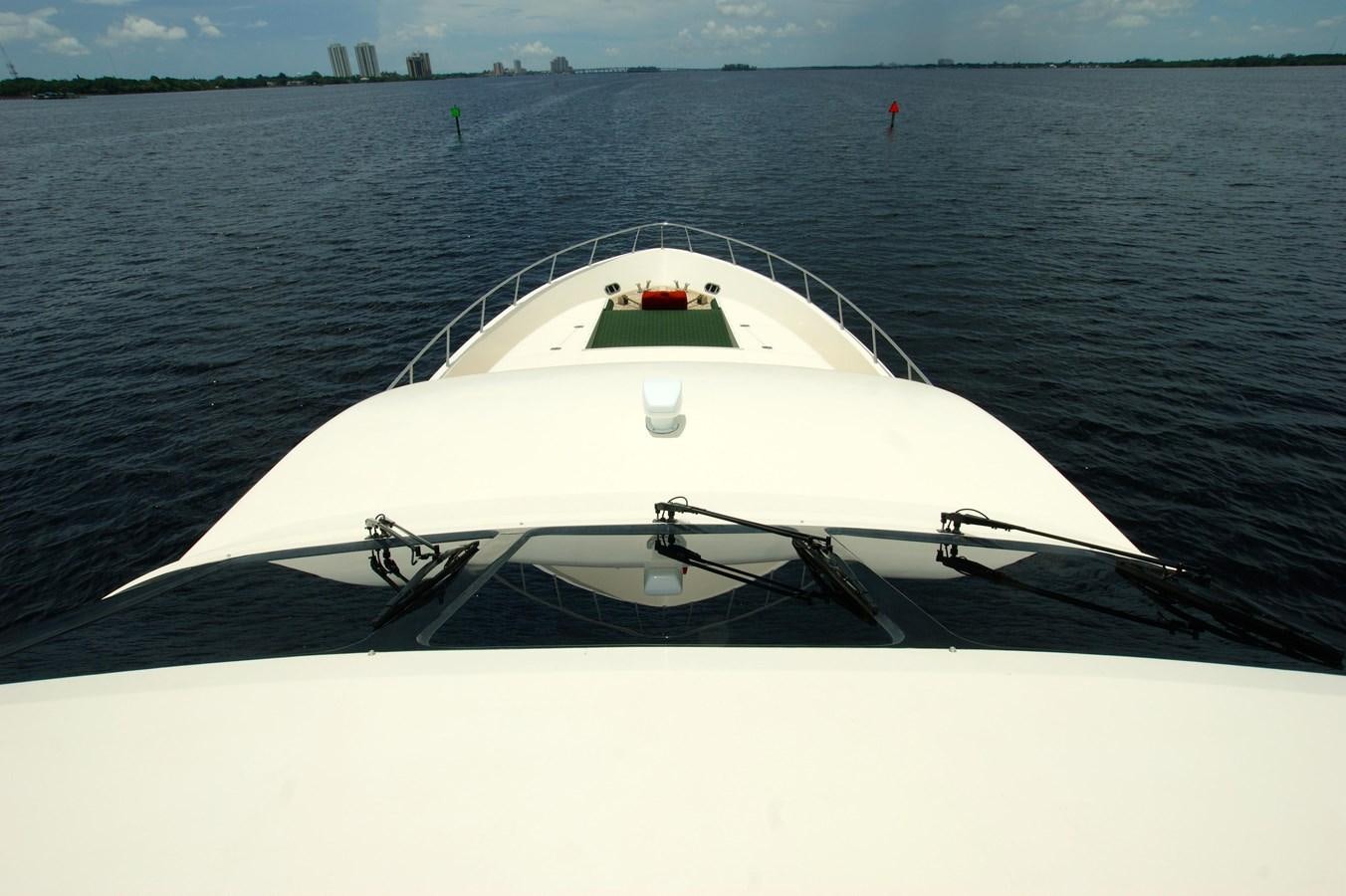 a white boat on the water aboard LORI ANN Yacht for Sale