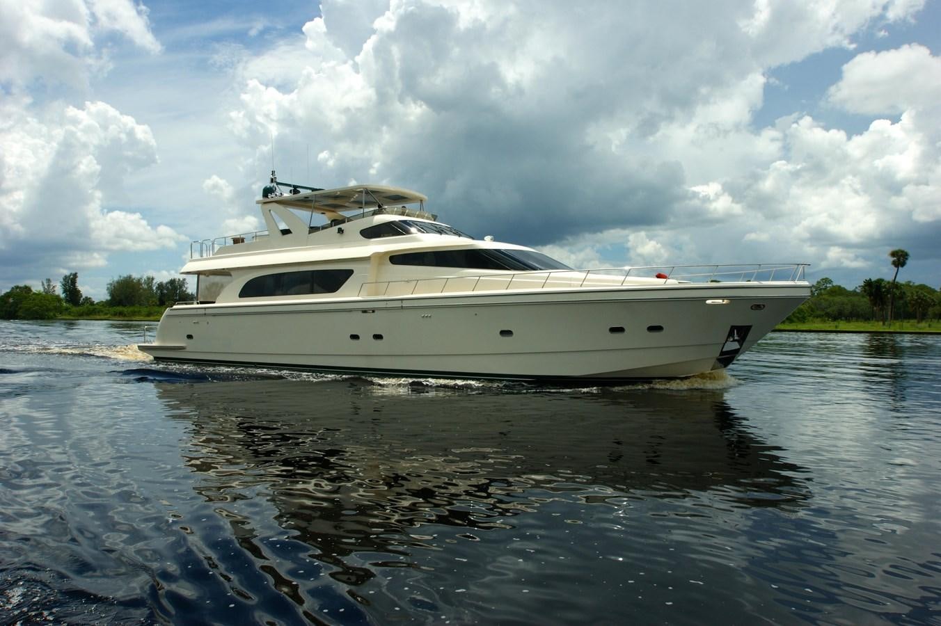 a white yacht on the water aboard LORI ANN Yacht for Sale