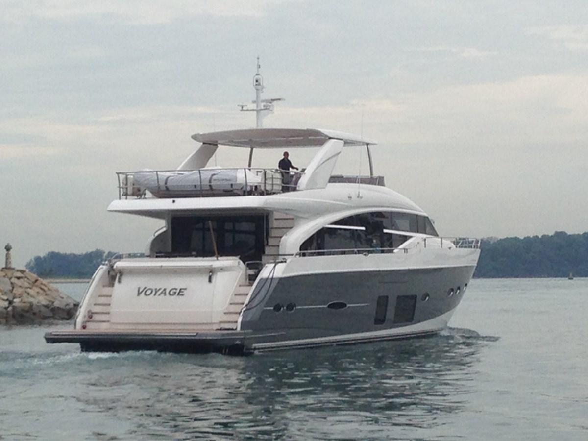 a white boat in the water aboard SEDNA Yacht for Sale