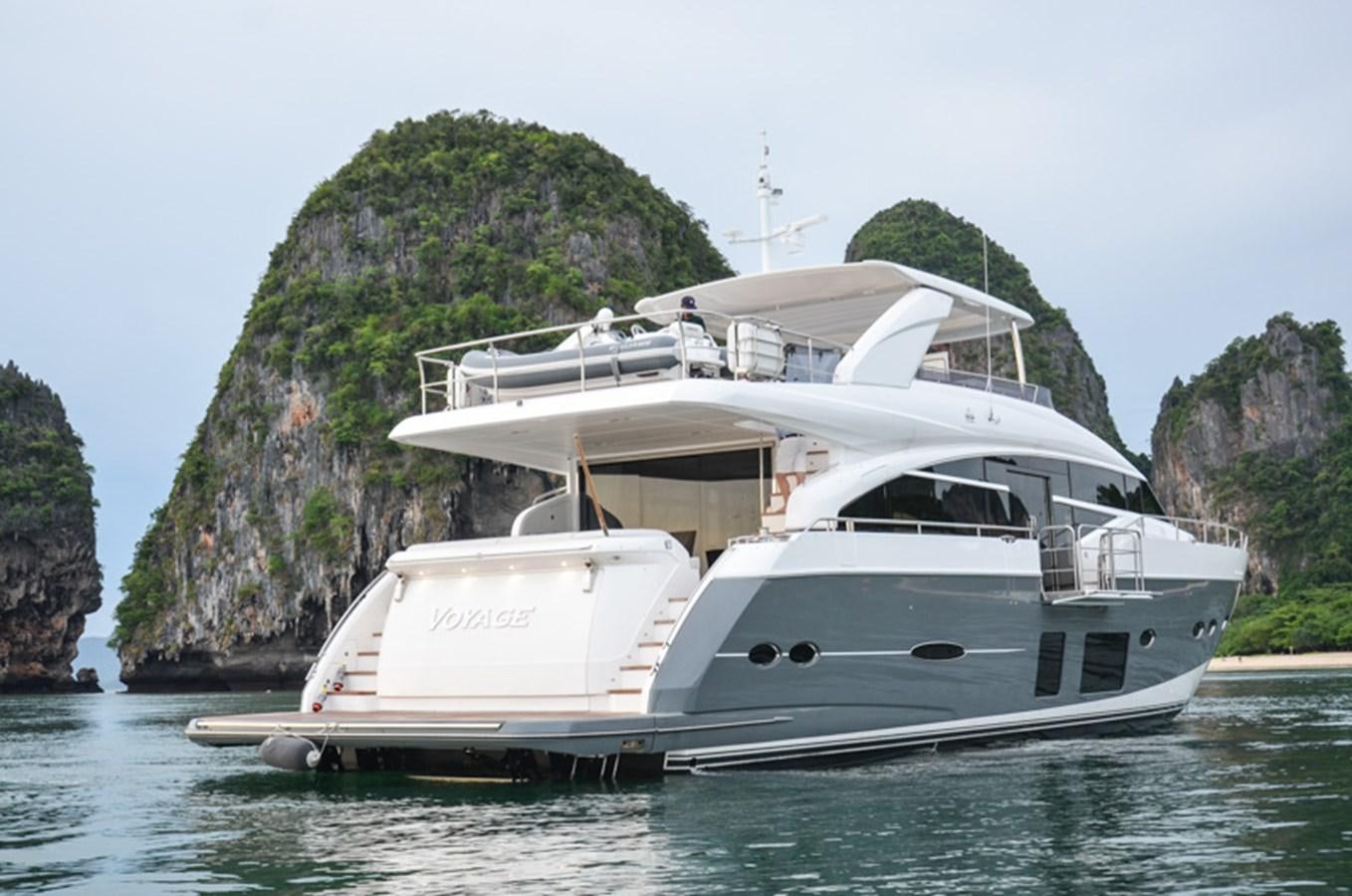 a couple of boats on the water aboard SEDNA Yacht for Sale