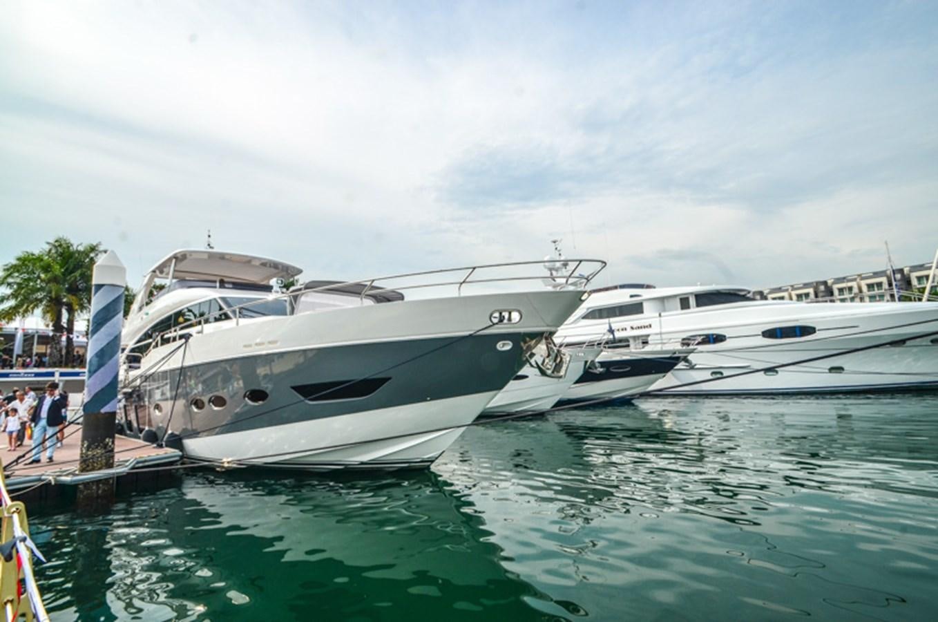 a boat docked at a pier aboard SEDNA Yacht for Sale