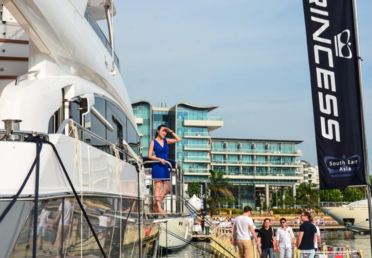 a couple of people on a boat aboard SEDNA Yacht for Sale
