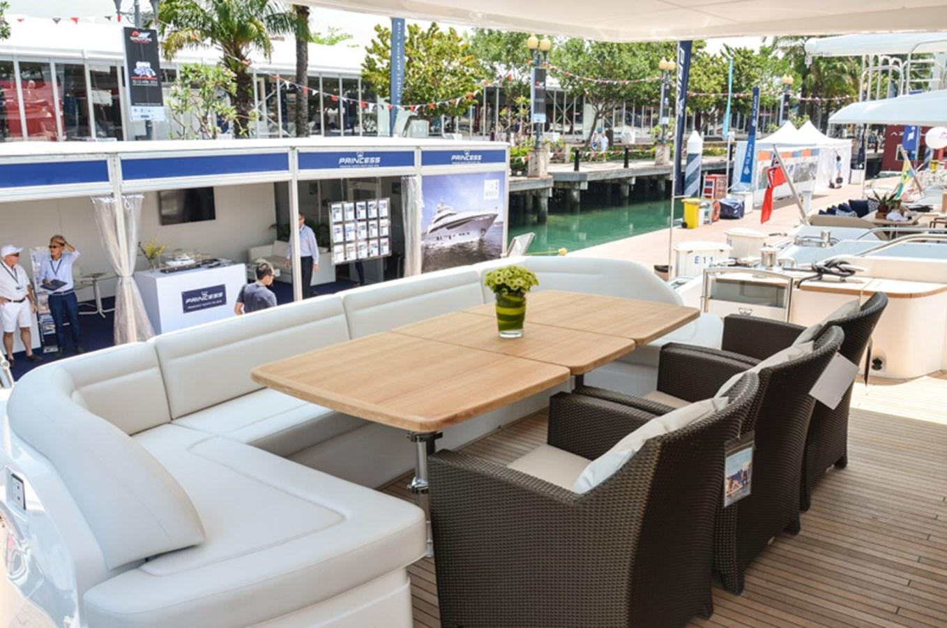 a table with chairs around it aboard SEDNA Yacht for Sale