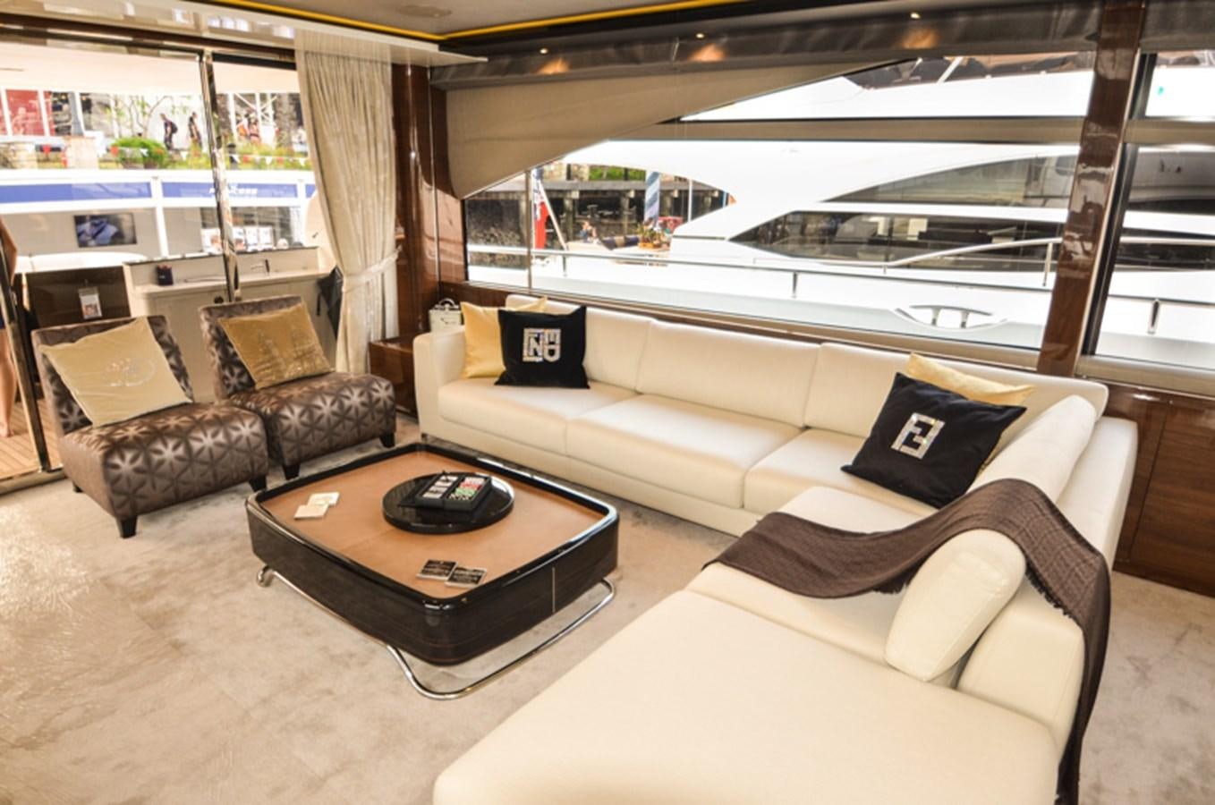 a living room with a large window aboard SEDNA Yacht for Sale