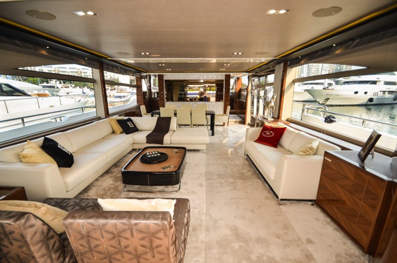 a living room with a large window aboard SEDNA Yacht for Sale
