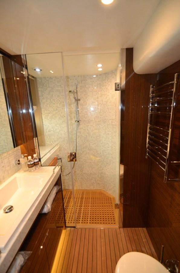 a bathroom with a shower and sink aboard SEDNA Yacht for Sale