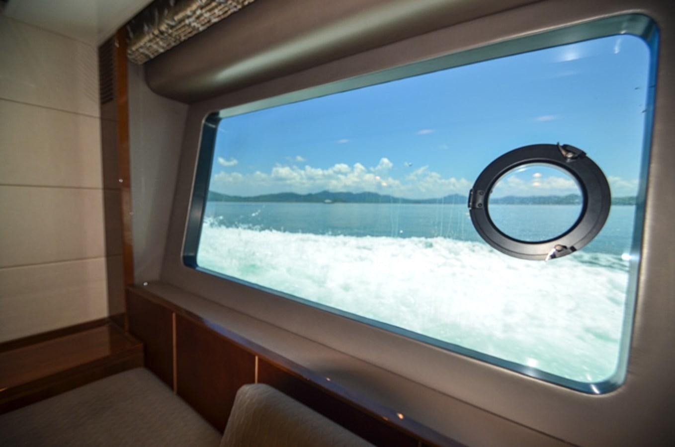 a window with a view of the ocean aboard SEDNA Yacht for Sale