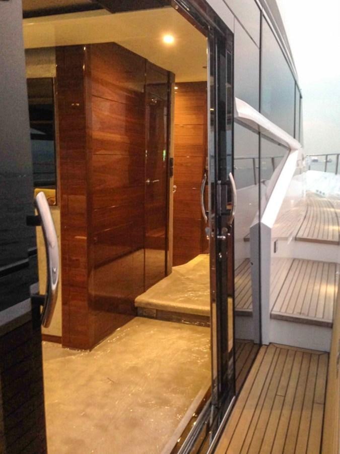 a room with a wood door aboard SEDNA Yacht for Sale