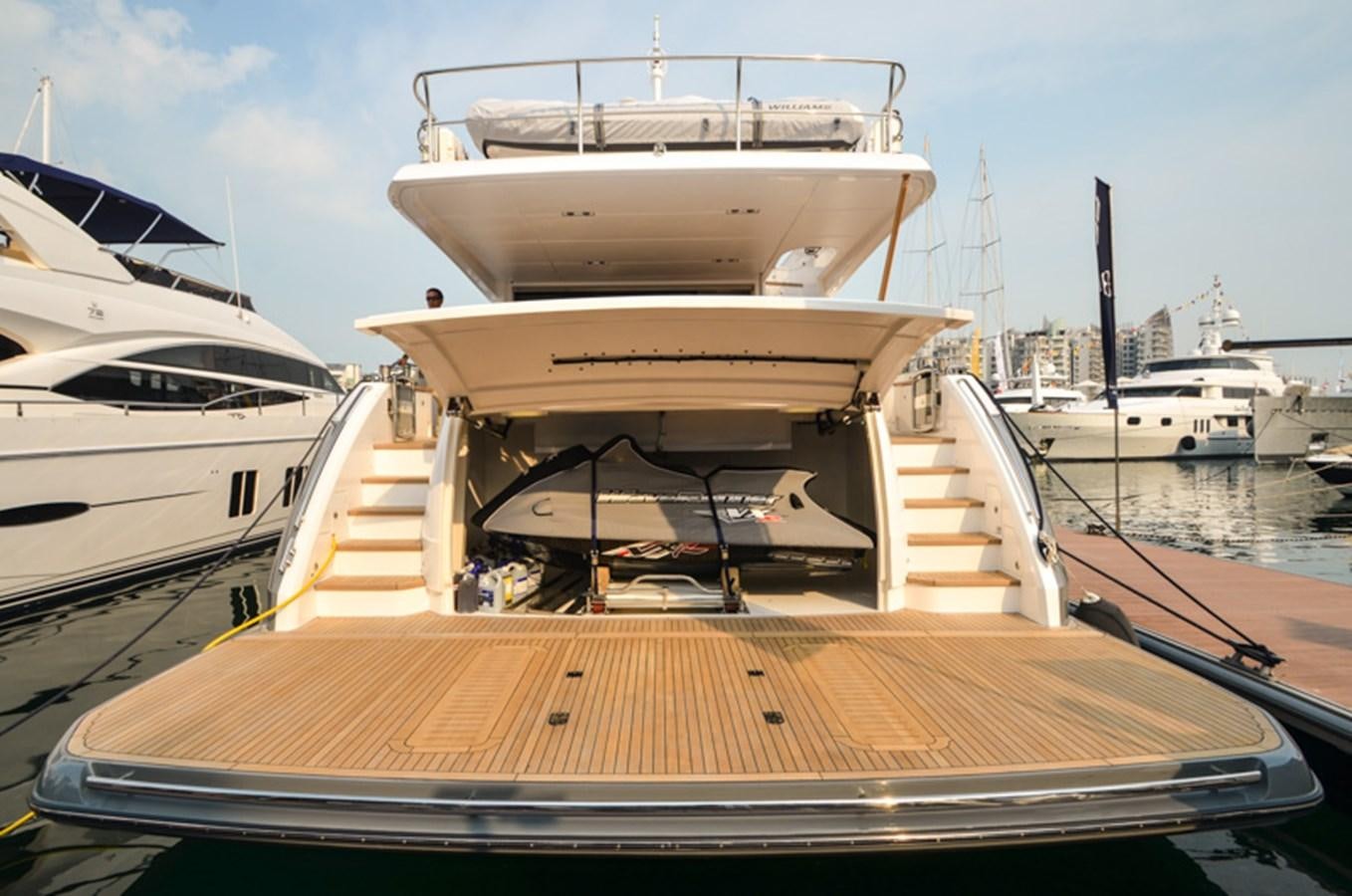 a boat docked at a pier aboard SEDNA Yacht for Sale