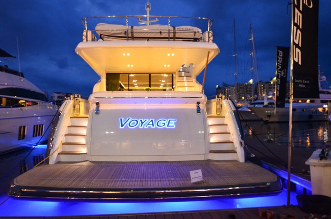 a large boat in a harbor aboard SEDNA Yacht for Sale