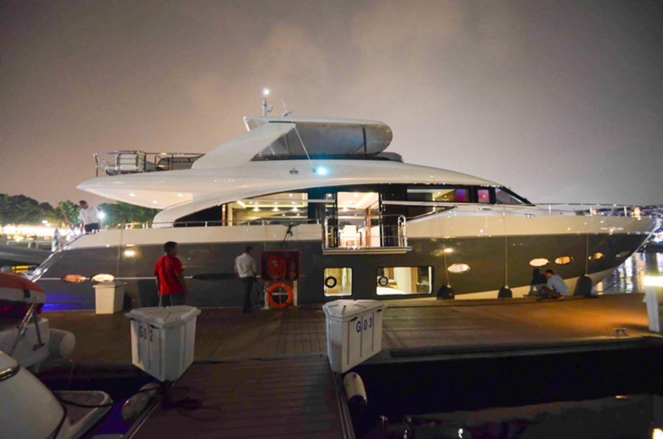 a large white boat docked at a pier aboard SEDNA Yacht for Sale