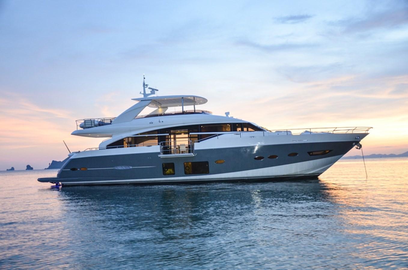 a white yacht in the water aboard SEDNA Yacht for Sale