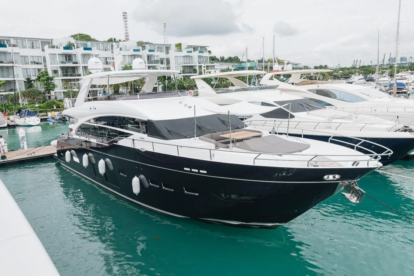 a boat in a harbor aboard ISLAND PRINCESS Yacht for Sale
