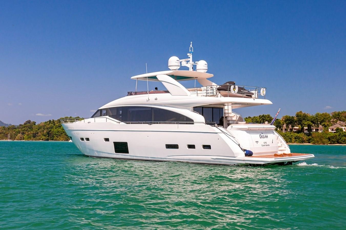 a white boat in the water aboard OCEAN Yacht for Sale