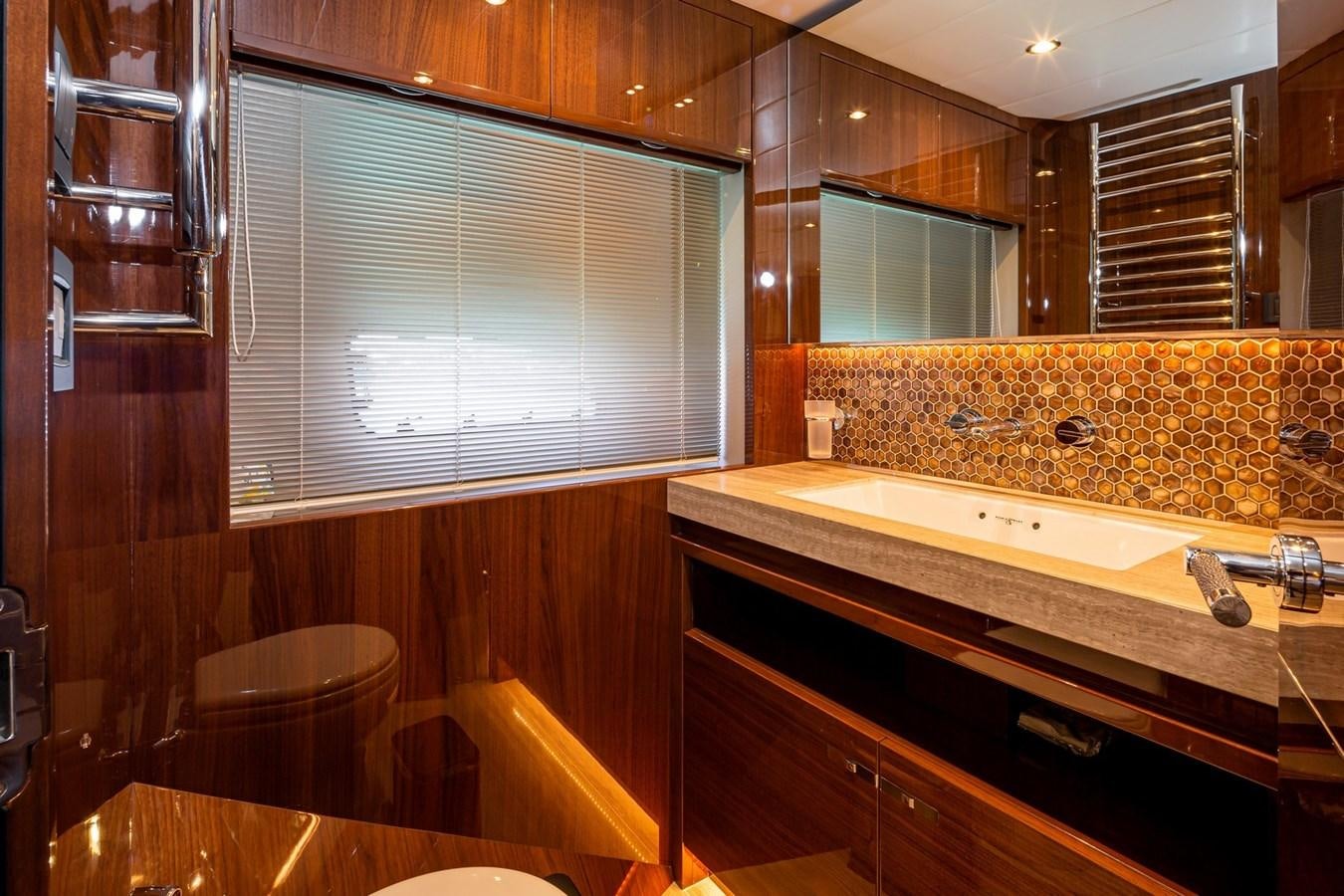 a bathroom with a large countertop aboard OCEAN Yacht for Sale