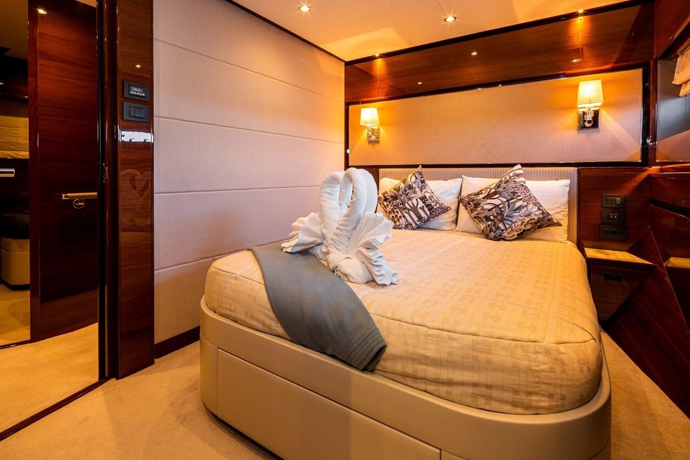 a bed in a hotel room aboard OCEAN Yacht for Sale