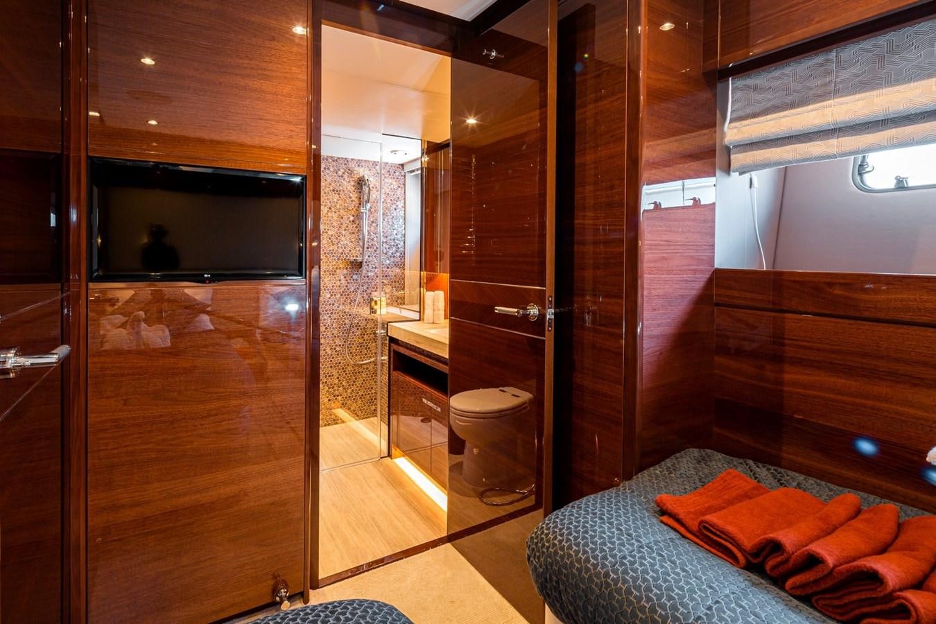 a bathroom with a glass door aboard OCEAN Yacht for Sale