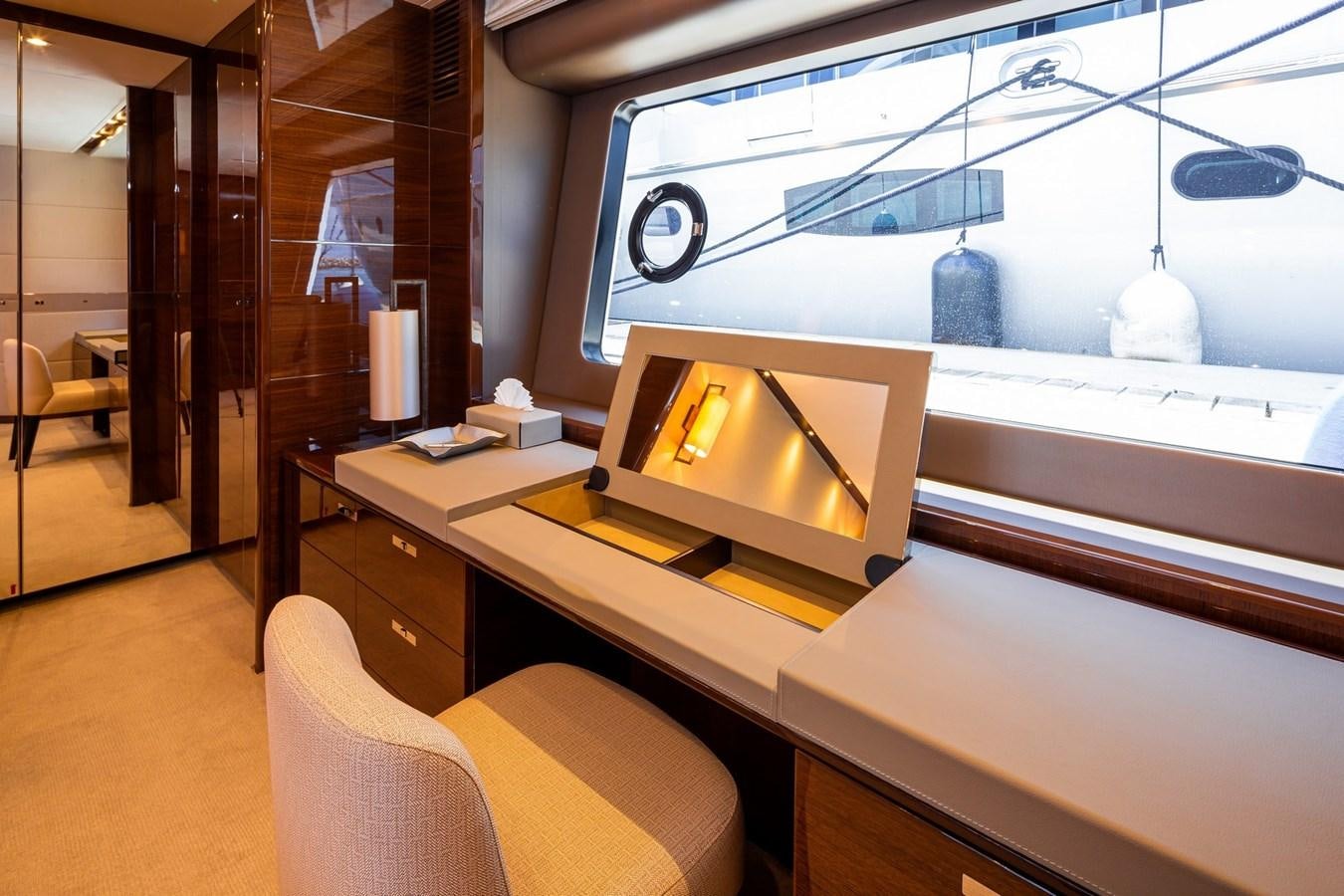a room with a desk and a computer aboard OCEAN Yacht for Sale