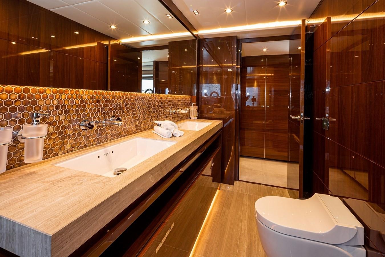 a bathroom with a large countertop aboard OCEAN Yacht for Sale