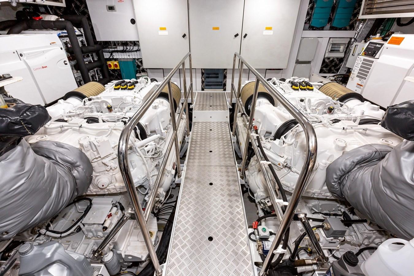 a room with a machine aboard OCEAN Yacht for Sale