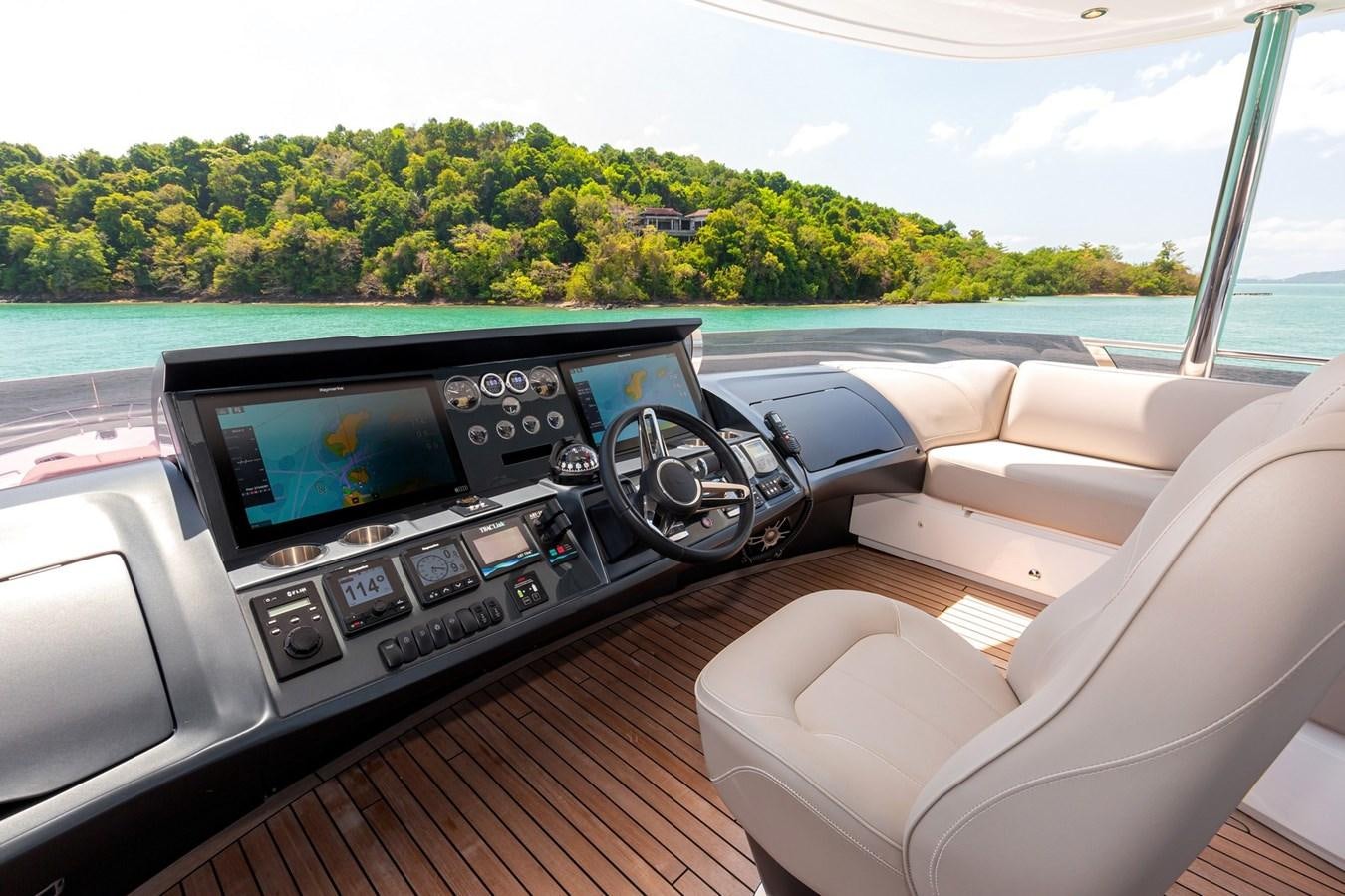 inside of a car aboard OCEAN Yacht for Sale
