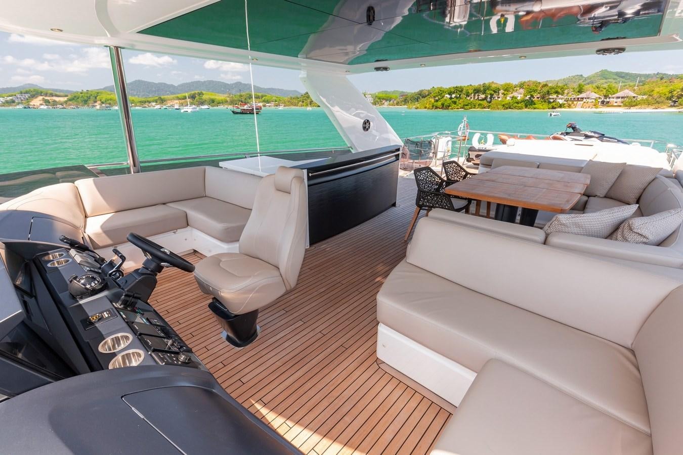 a boat on a deck aboard OCEAN Yacht for Sale