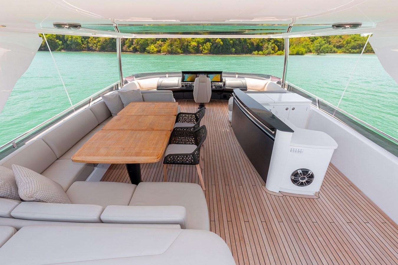 a boat on a deck aboard OCEAN Yacht for Sale