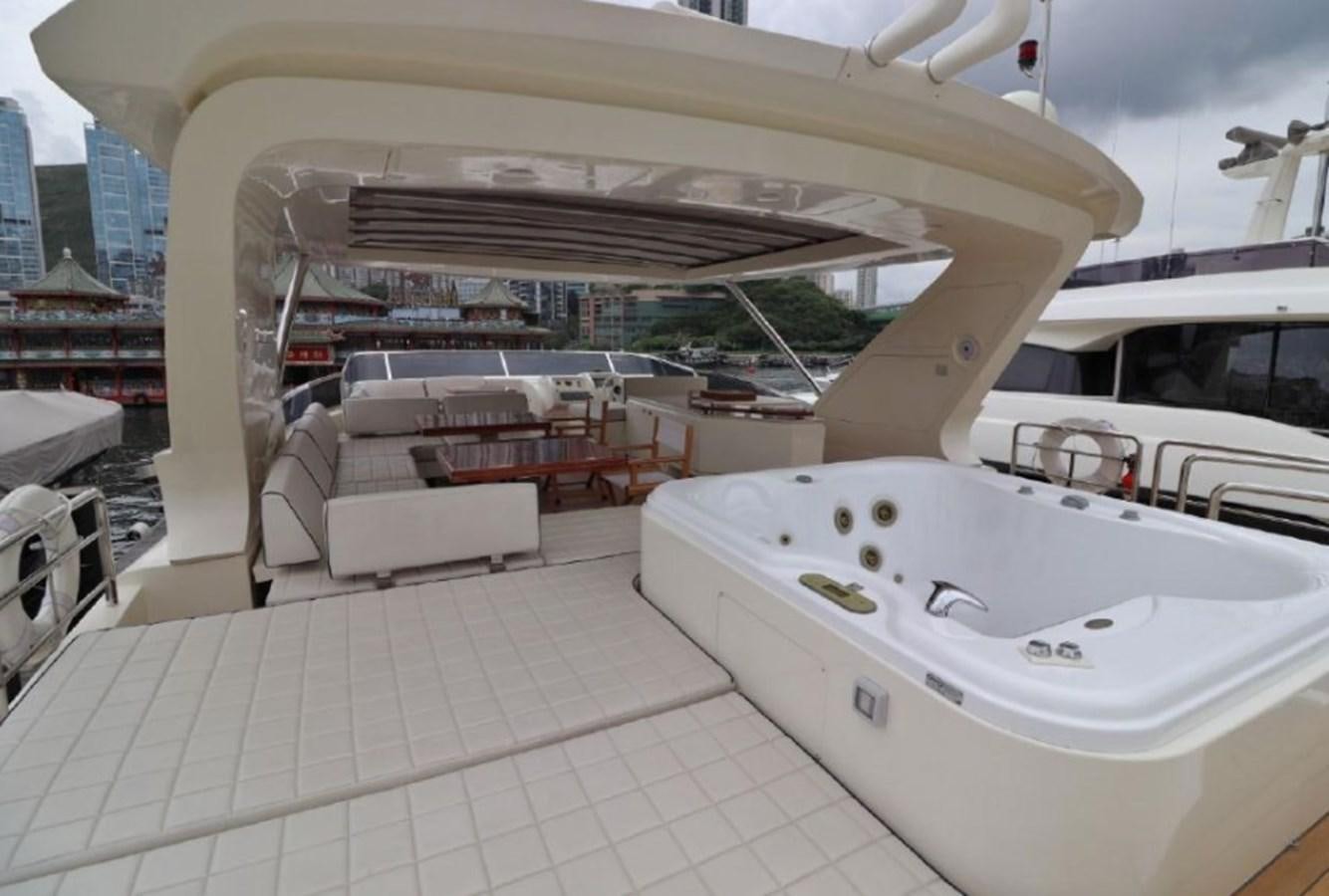 a large white boat with a large white boat on it aboard AZIMUT AZ 85/124 Yacht for Sale